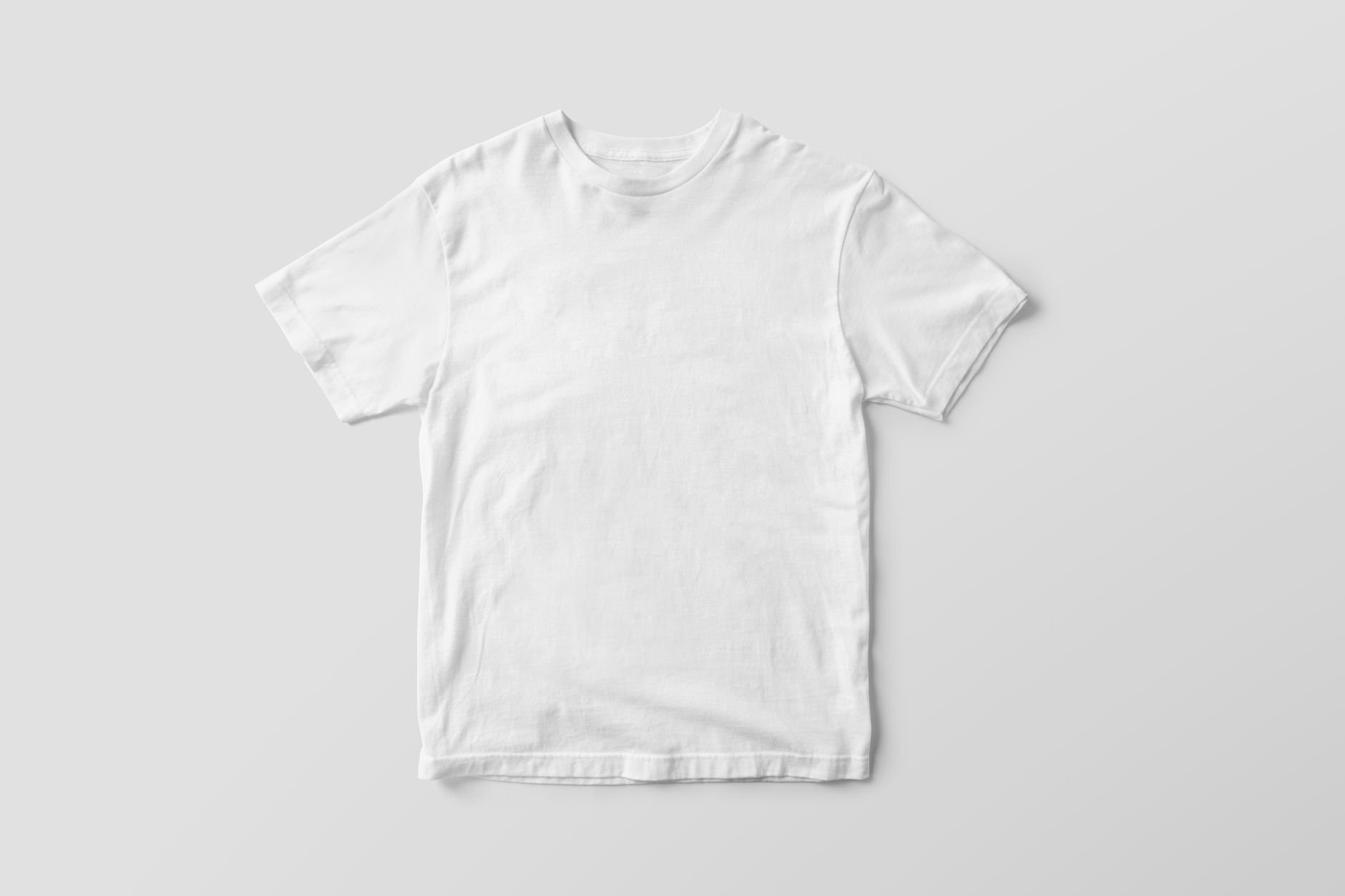 Simple white t-shirt mockup on a plain background, perfect for design presentations and branding.